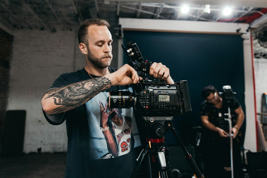 Experienced journalist leading a masterclass workshop for a small group of media professionals
