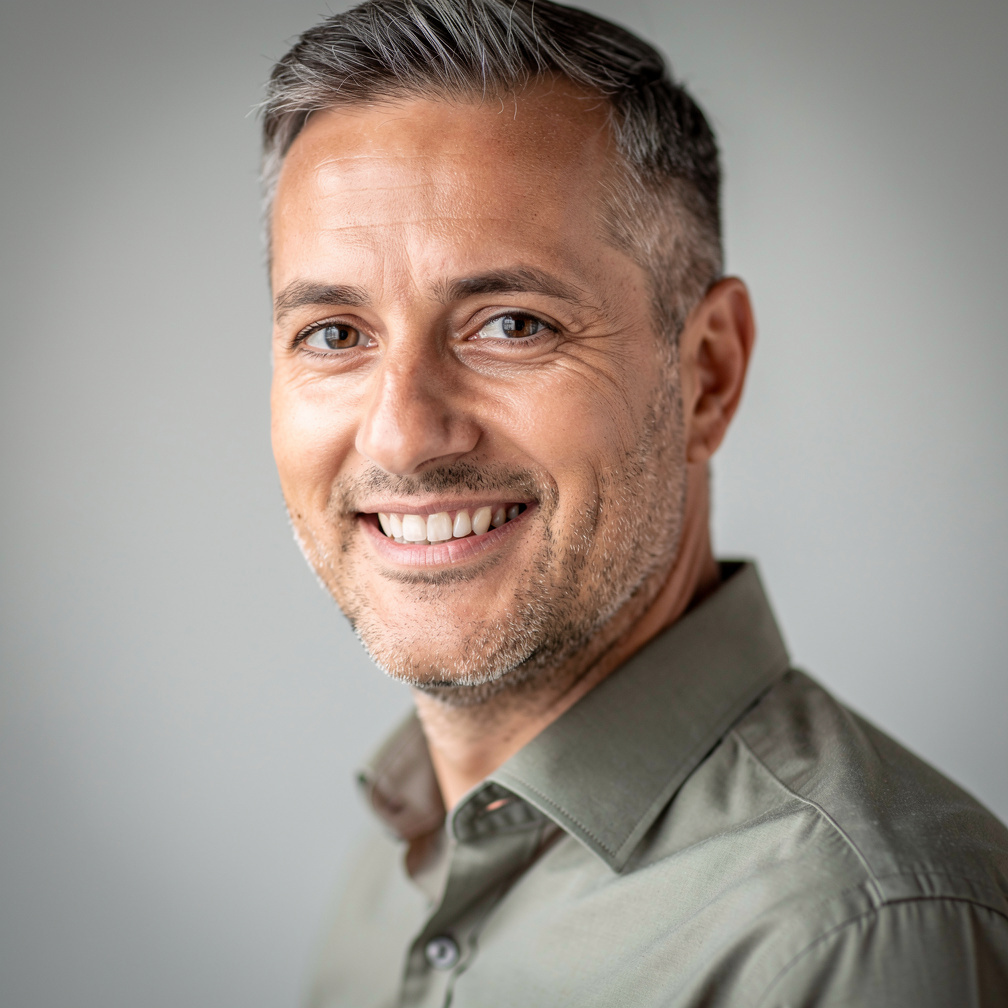 Portrait of a Belgian male radio journalist smiling