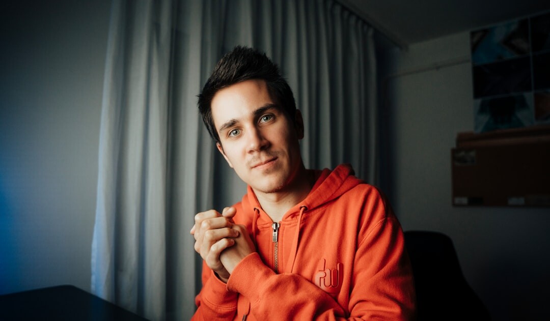 Portrait of a Belgian male television interviewer with a suit