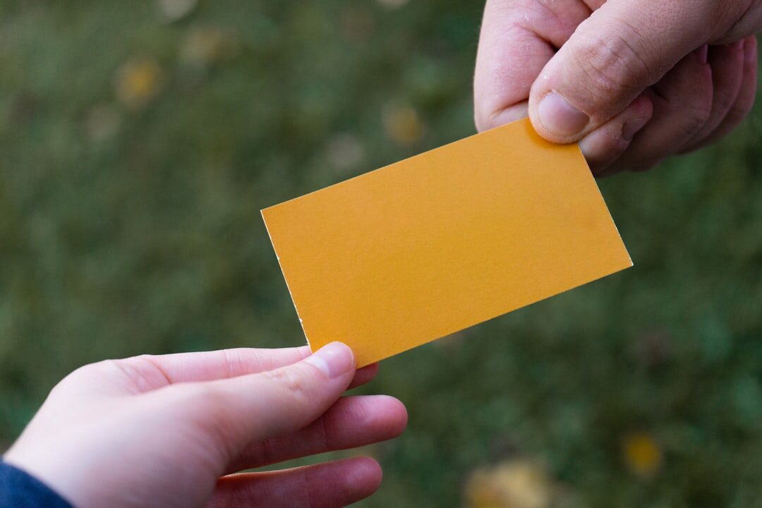people exchanging business cards
